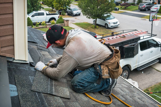 Professional Roofing technician working in Lowell, VT